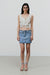 THE WAISTLESS MINI SKIRT <br> Light Bleach